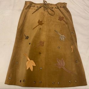 Luxury suede skirt with leather appliquéd leaves